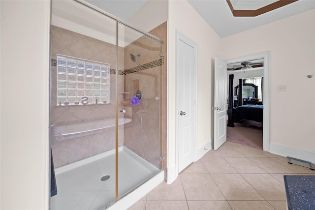 full bathroom with baseboards, a shower stall, ensuite bath, and tile patterned floors