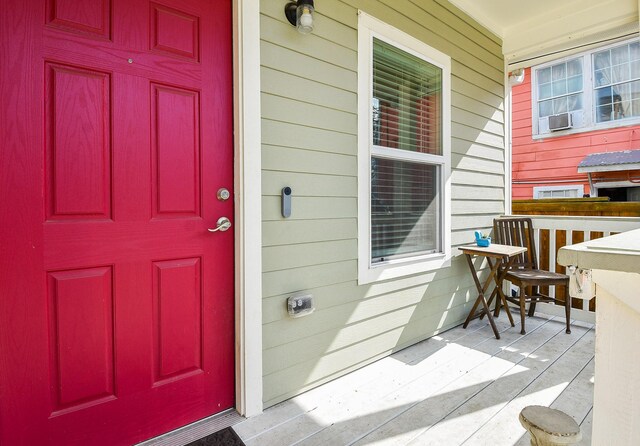 doorway to property featuring a porch