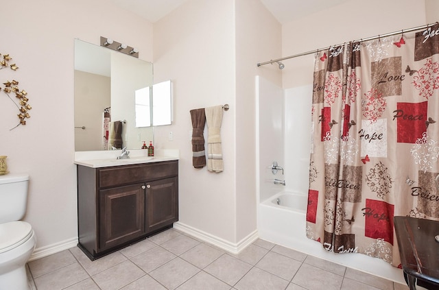full bathroom featuring shower / bath combination with curtain, tile patterned floors, toilet, and vanity