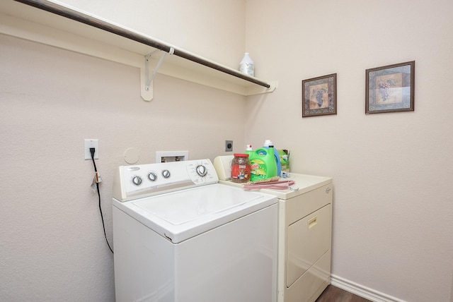 laundry room with washer and clothes dryer