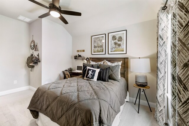 bedroom with visible vents, baseboards, a ceiling fan, lofted ceiling, and carpet