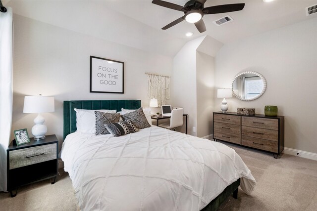 bedroom with carpet, visible vents, vaulted ceiling, and baseboards