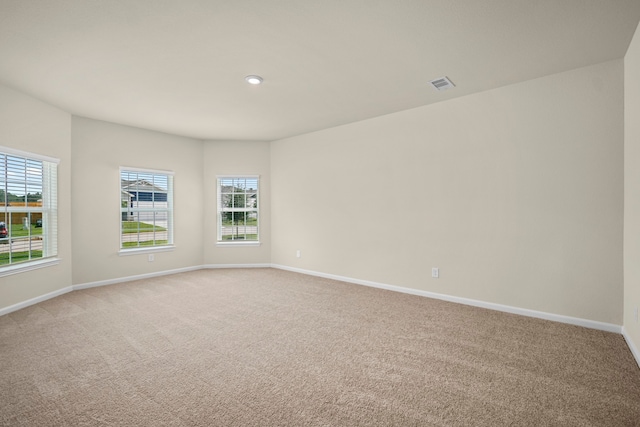 view of carpeted spare room