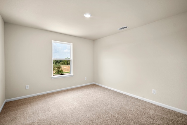 spare room with carpet flooring