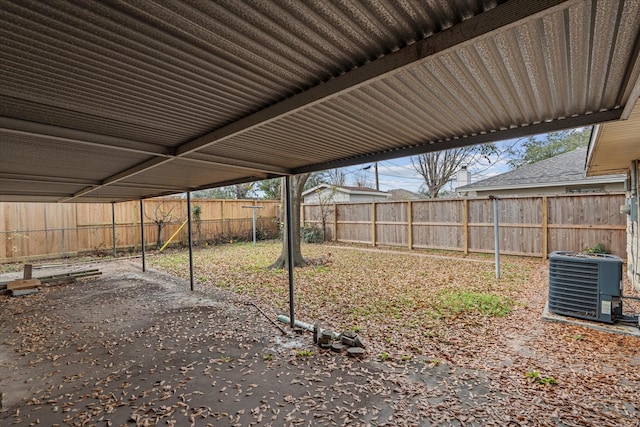 view of yard featuring a patio area and central air condition unit