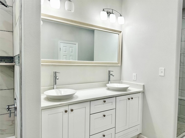 bathroom with vanity and an enclosed shower