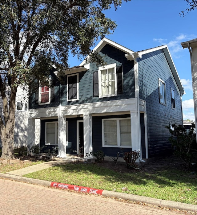 view of front facade with a front lawn