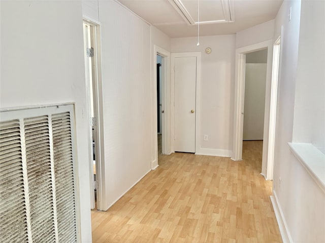 hallway featuring light hardwood / wood-style flooring