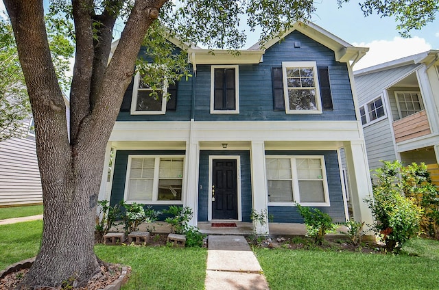 3802 E Traditions Ct, Houston, TX 77082 - view of front facade with a porch and a front yard