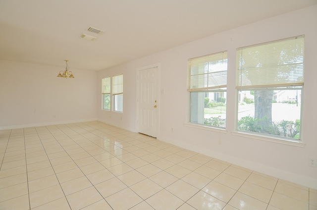 3802 E Traditions Ct, Houston, TX 77082 - spare room with light tile patterned floors, baseboards, and a chandelier