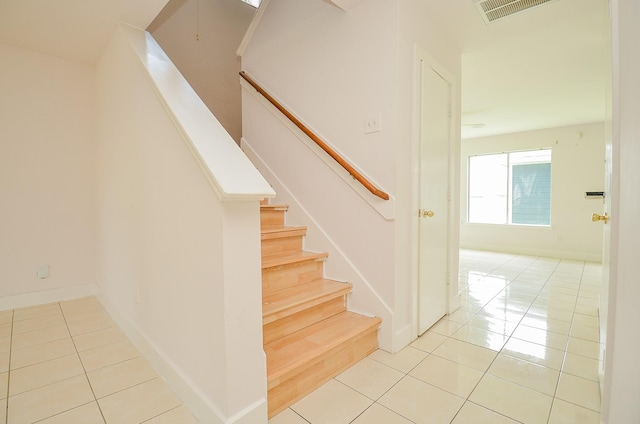 3802 E Traditions Ct, Houston, TX 77082 - stairway featuring tile patterned floors and baseboards
