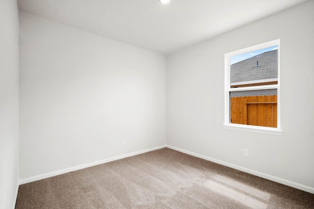 spare room with carpet flooring