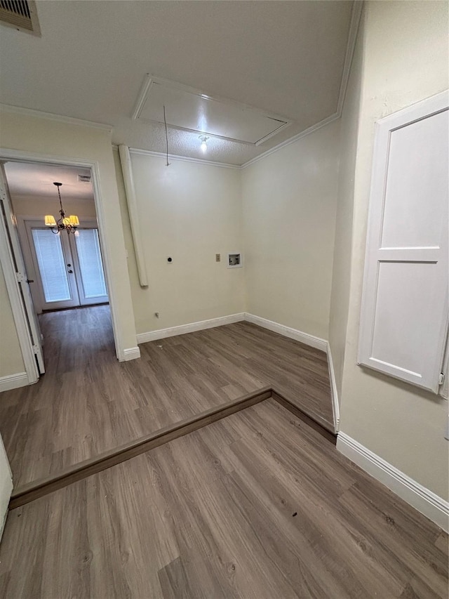 washroom featuring ornamental molding and hardwood / wood-style floors