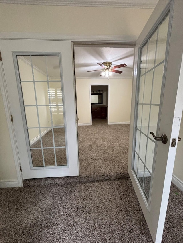 interior space featuring french doors, ceiling fan, and carpet floors