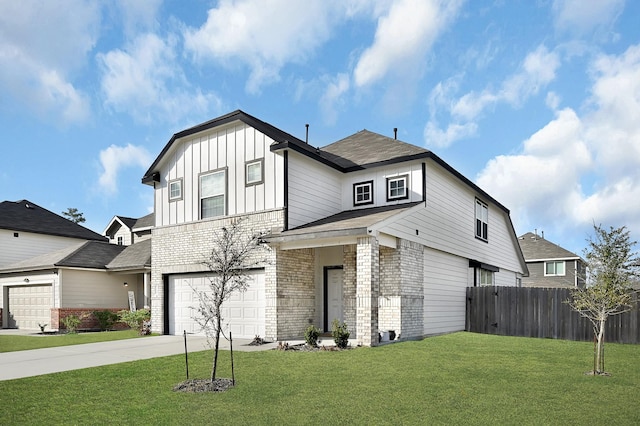 view of front of house featuring a garage and a front yard