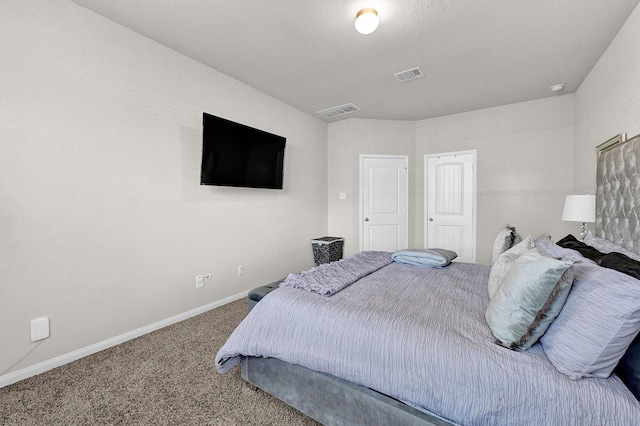 bedroom featuring carpet