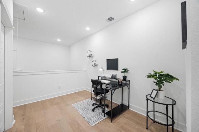 324 Neyland St, Houston, TX 77022 - office space with wood finished floors, attic access, baseboards, and recessed lighting