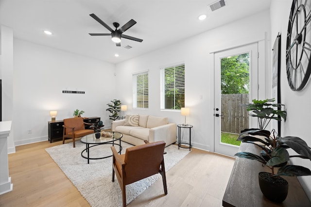 324 Neyland St, Houston, TX 77022 - living room with light wood-style floors, ceiling fan, baseboards, and recessed lighting