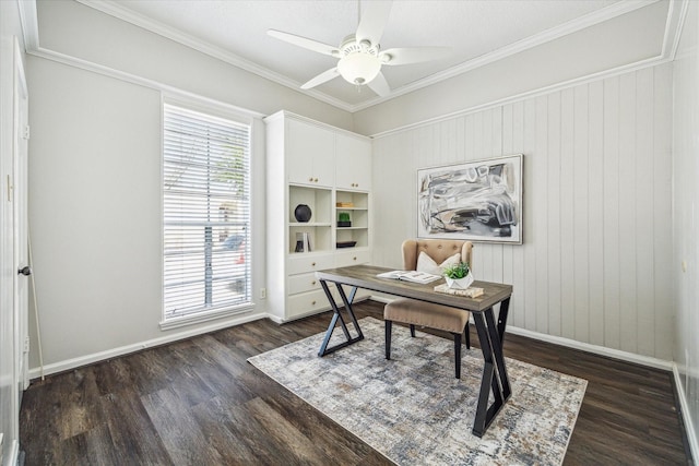 office featuring dark wood-type flooring, ornamental molding, and ceiling fan