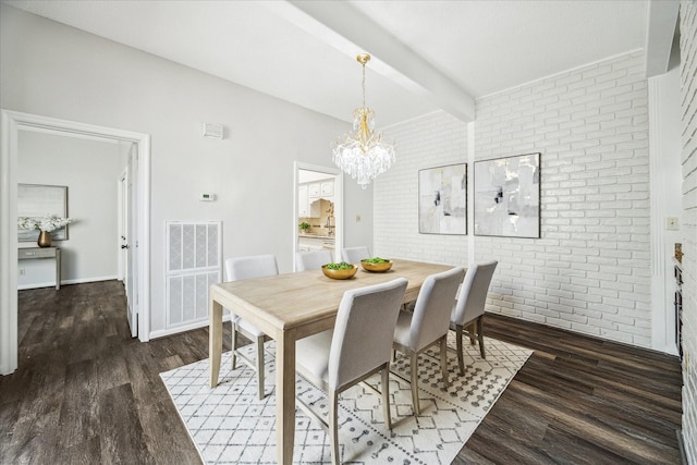 dining room with dark wood-type flooring, brick wall, beam ceiling, and a notable chandelier