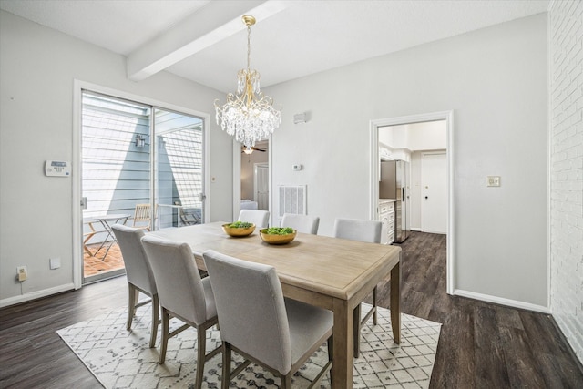 dining room with a notable chandelier, dark hardwood / wood-style floors, beamed ceiling, and brick wall