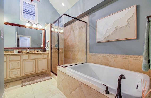 bathroom featuring vanity, separate shower and tub, and tile patterned floors