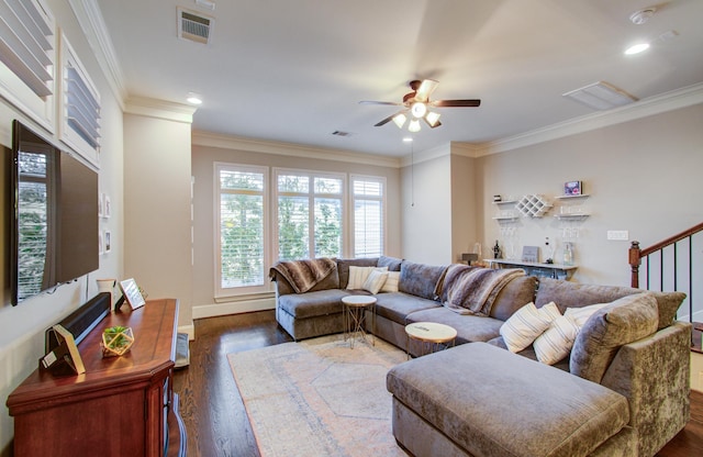 living room featuring crown molding, ceiling fan, and dark hardwood / wood-style flooring