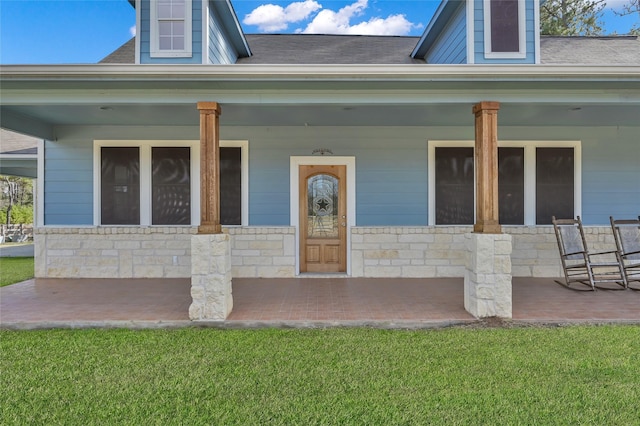 entrance to property with covered porch