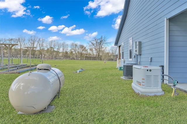 view of yard with central air condition unit