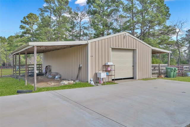 view of outbuilding featuring a garage