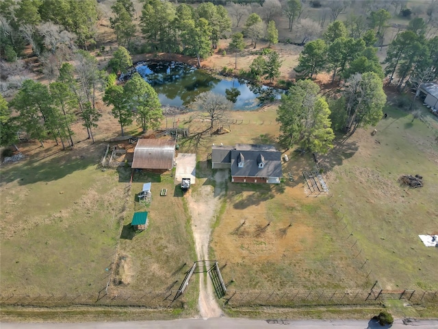 aerial view with a rural view and a water view