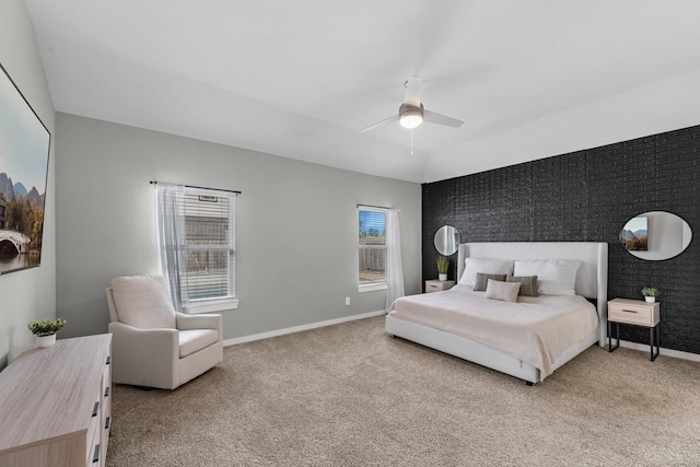 bedroom featuring light colored carpet and ceiling fan