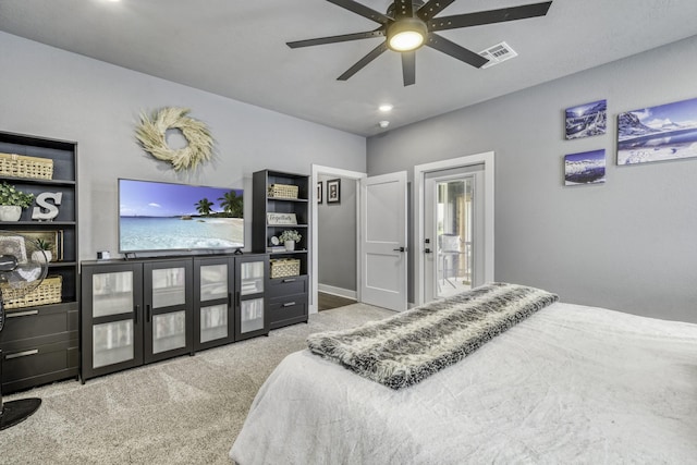 carpeted bedroom featuring ceiling fan