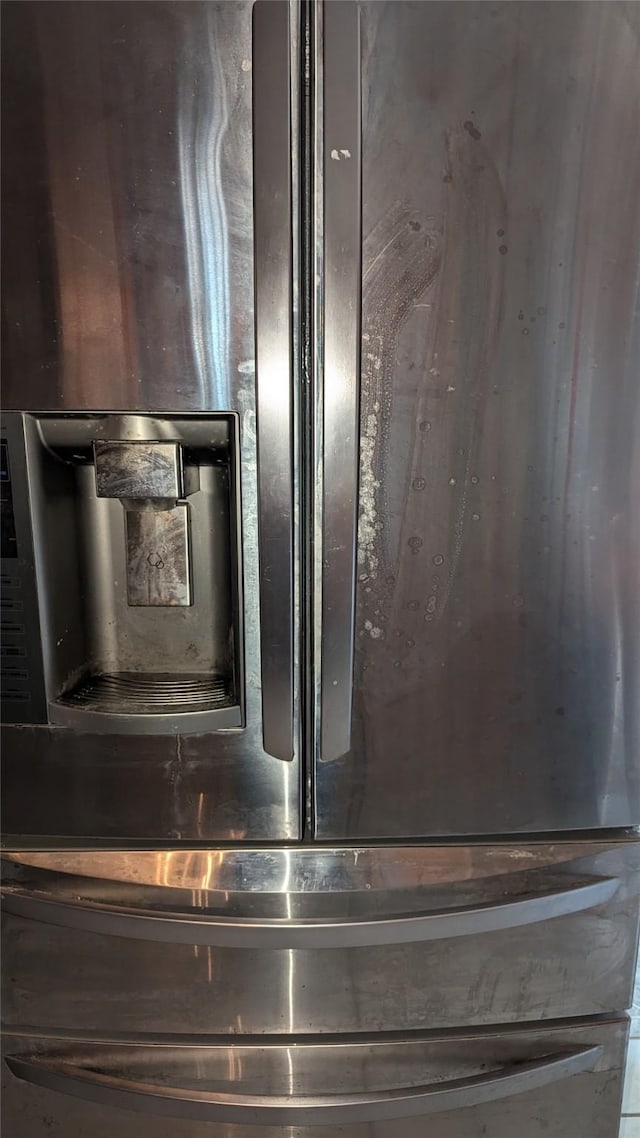 details with stainless steel fridge with ice dispenser