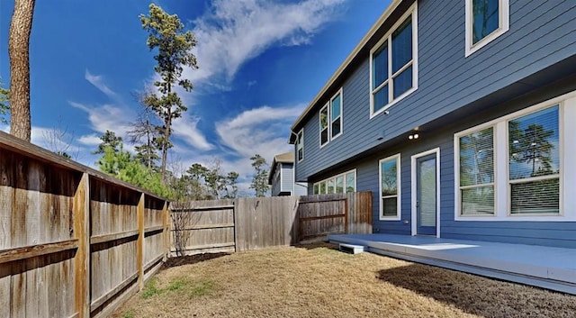 view of yard with a fenced backyard and a patio