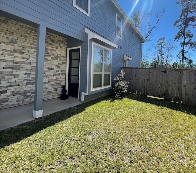 view of yard with a patio area and fence