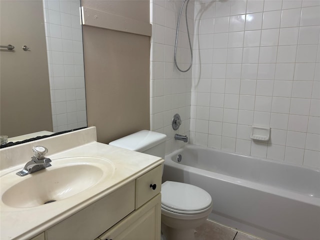 full bathroom with tiled shower / bath combo, vanity, and toilet