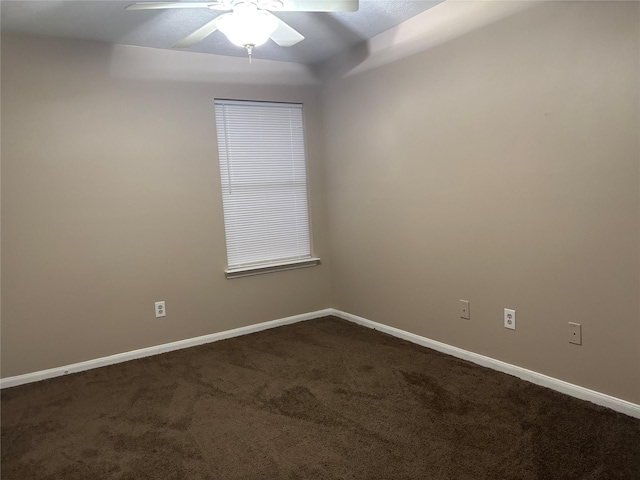 unfurnished room featuring carpet and ceiling fan