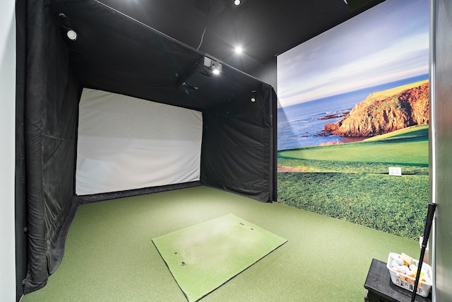 game room with golf simulator and carpet floors