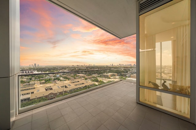 view of balcony at dusk