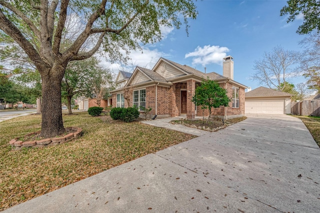 view of front of home with a garage and a front yard