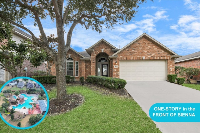 front facade featuring a garage and a front yard