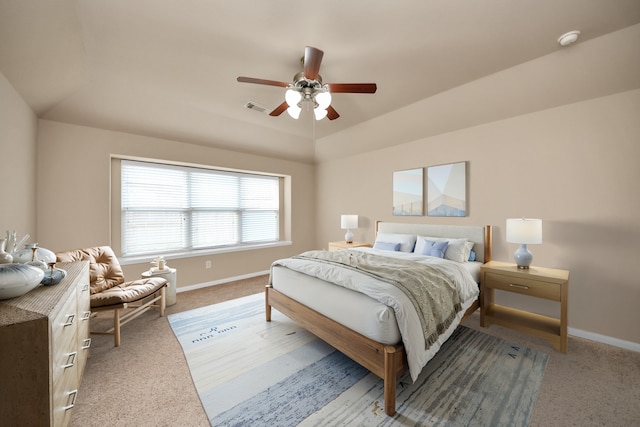 bedroom with ceiling fan and light colored carpet