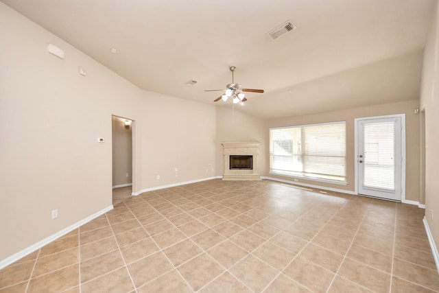 unfurnished living room with lofted ceiling, light tile patterned floors, and ceiling fan