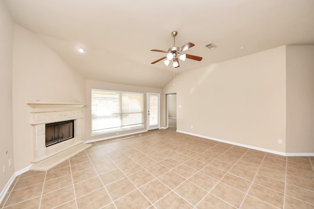 unfurnished living room featuring lofted ceiling, light tile patterned floors, and ceiling fan