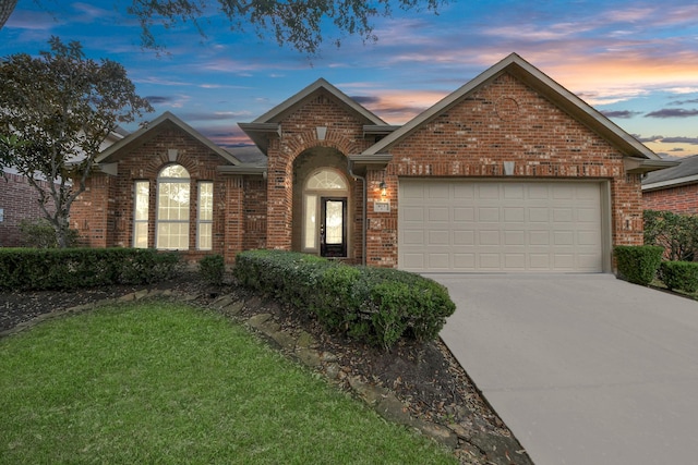 view of front of property with a garage