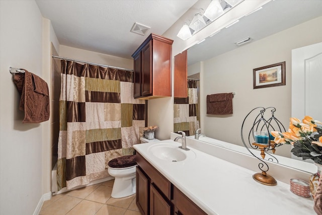 full bathroom featuring vanity, shower / bathtub combination with curtain, tile patterned floors, and toilet