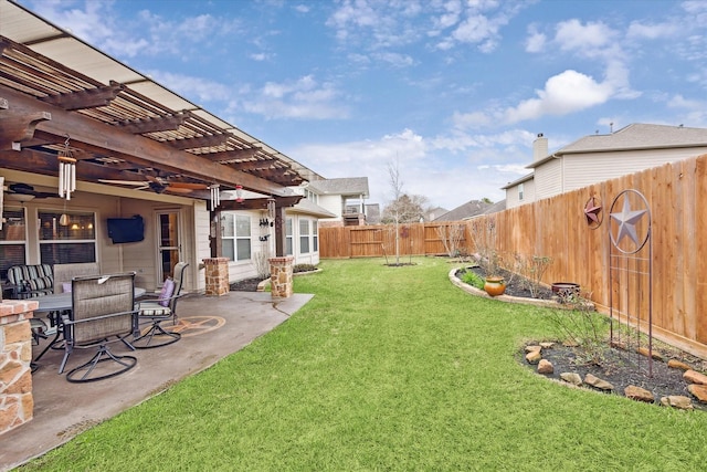 view of yard with a pergola and a patio area