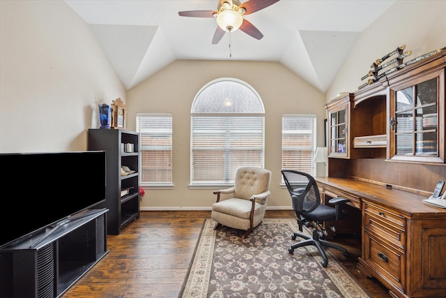 office space featuring vaulted ceiling, dark wood-type flooring, and ceiling fan