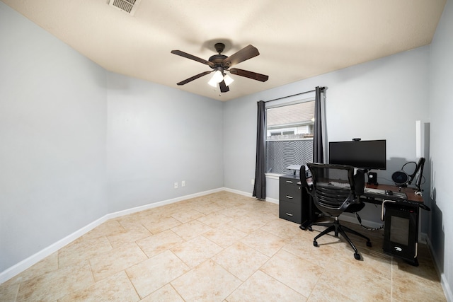 home office with light tile patterned flooring and ceiling fan